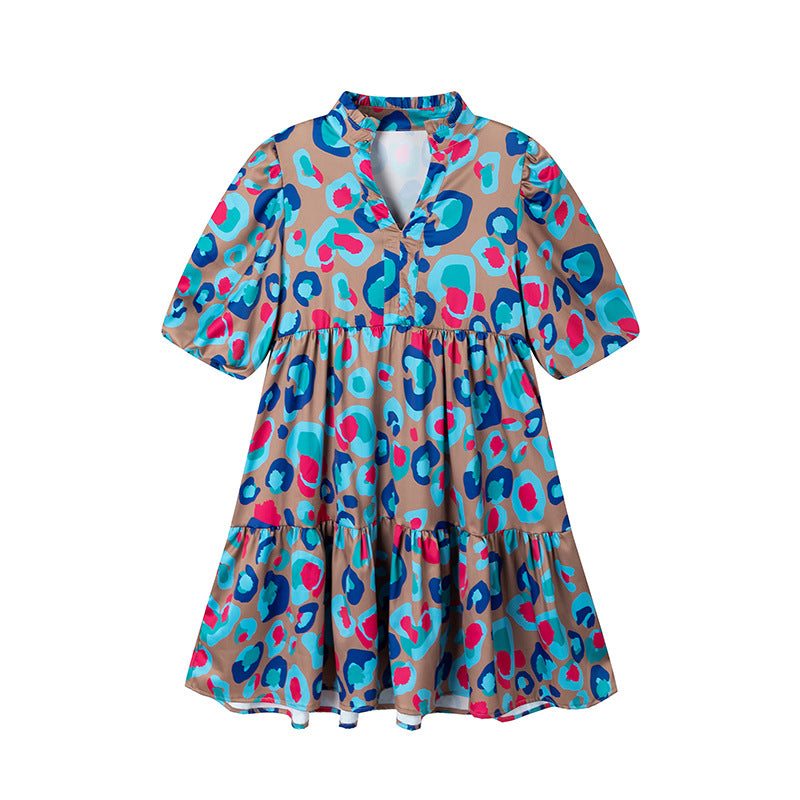 Short ruffled fluid dress for women with colorful print Lune London