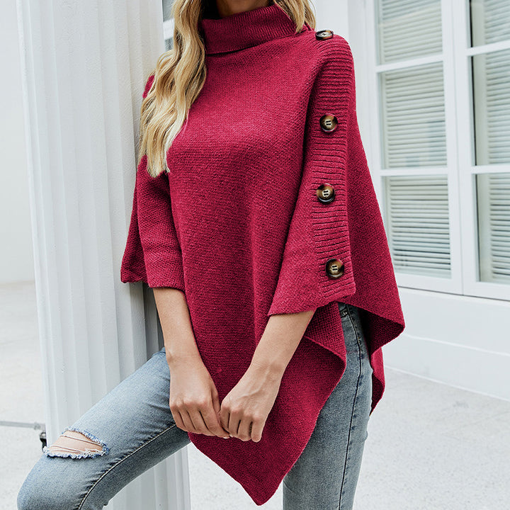 Lady knit poncho with high collar and decorative buttons Lune London