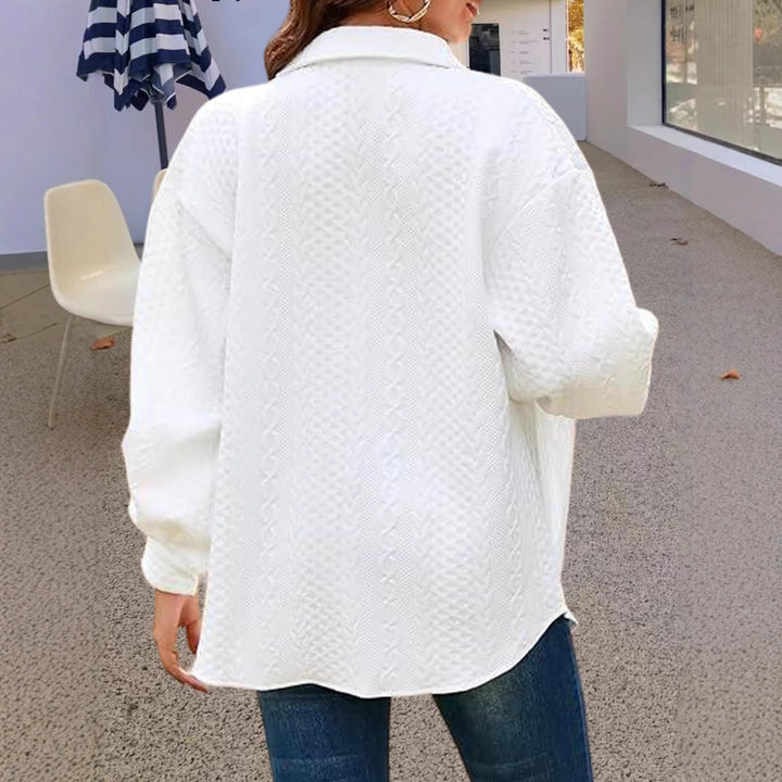 Oversized knitted blouse for women with a modern braid pattern Lune London