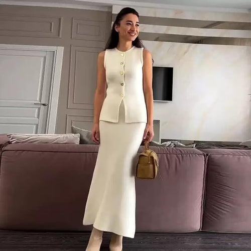 Women’s outfit including a sleeveless top with button details and a flared skirt Amarae