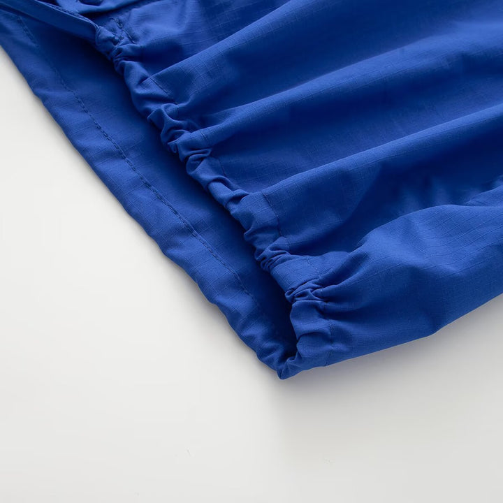 Women's transitional jacket with wide balloon sleeves, stand-up collar and drawstring.