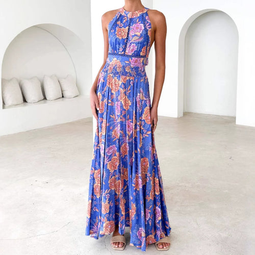 Women’s maxi dress with elegant floral design and flowing skirt