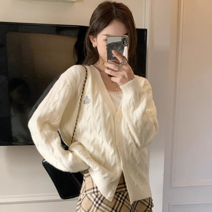 Cardigan pour femmes avec motif en câble et grands boutons Chic & Stil