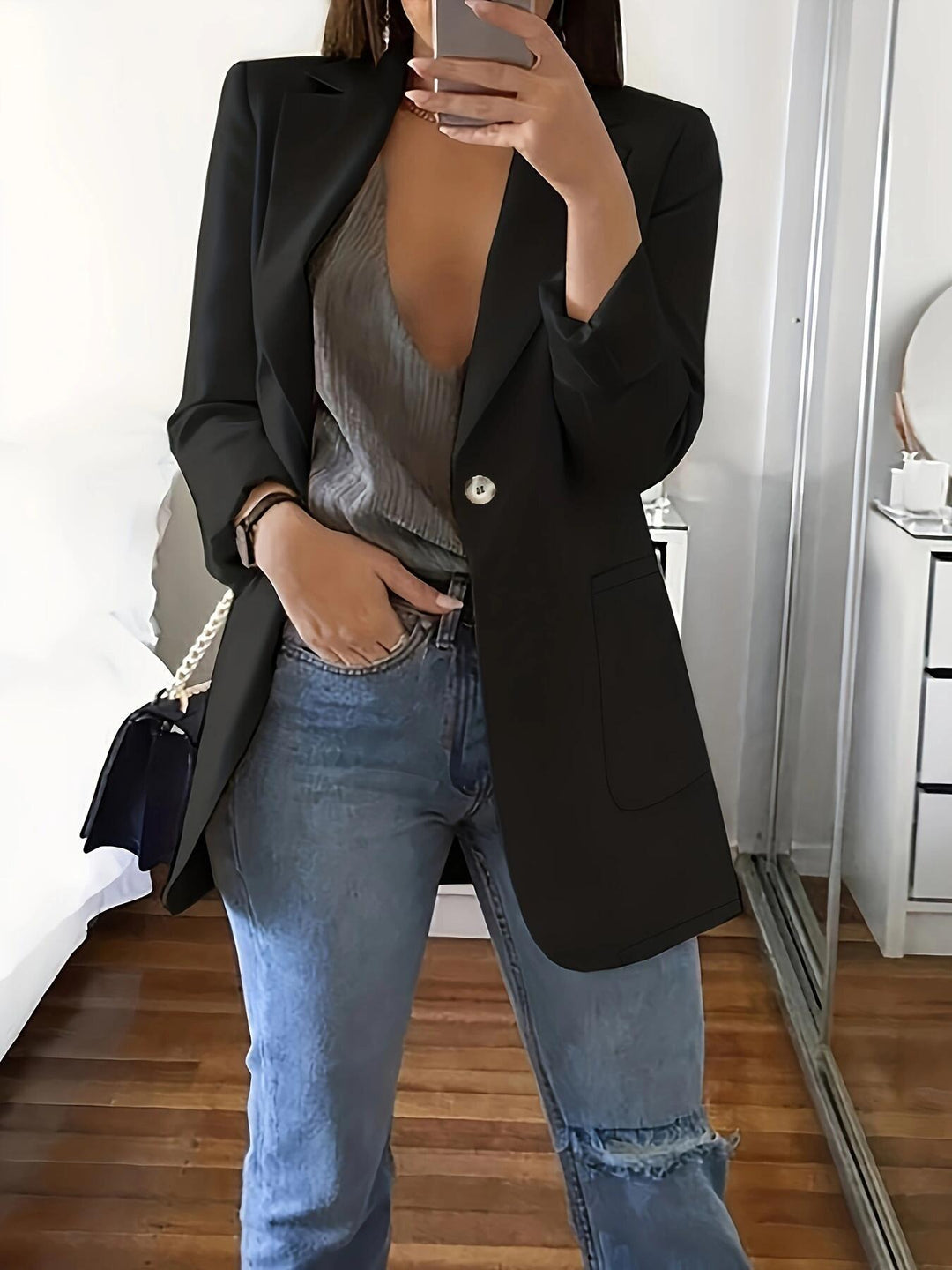 Elegant women's blazer jacket with shiny button details and spacious pockets Lune London