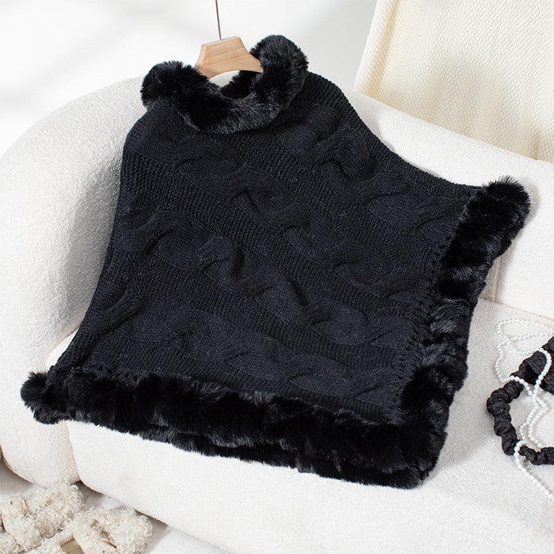 Ladies cozy poncho sweater with soft faux fur trim and cable knit pattern Lune London