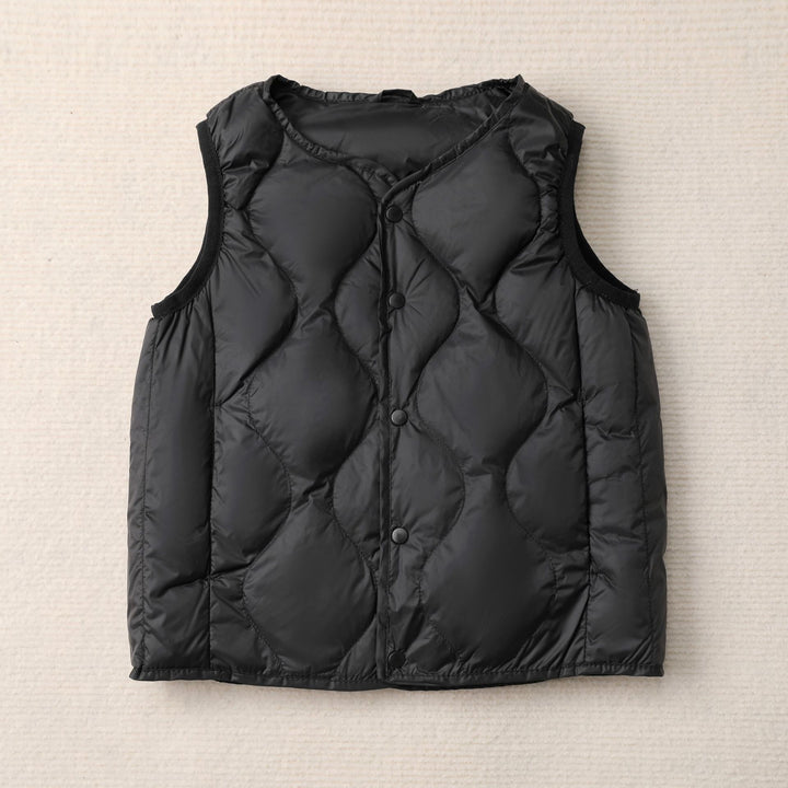 Sleeveless women's jacket with a stylish quilted pattern and functional snap buttons Lune London