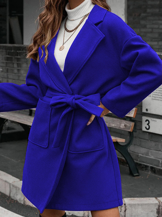 Ladies wrap coat with tie belt, large flap pocket and lapel collar Amarae