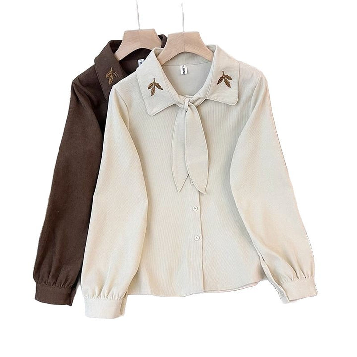 Blouse élégante pour femmes avec col en nœud Chic & Stil