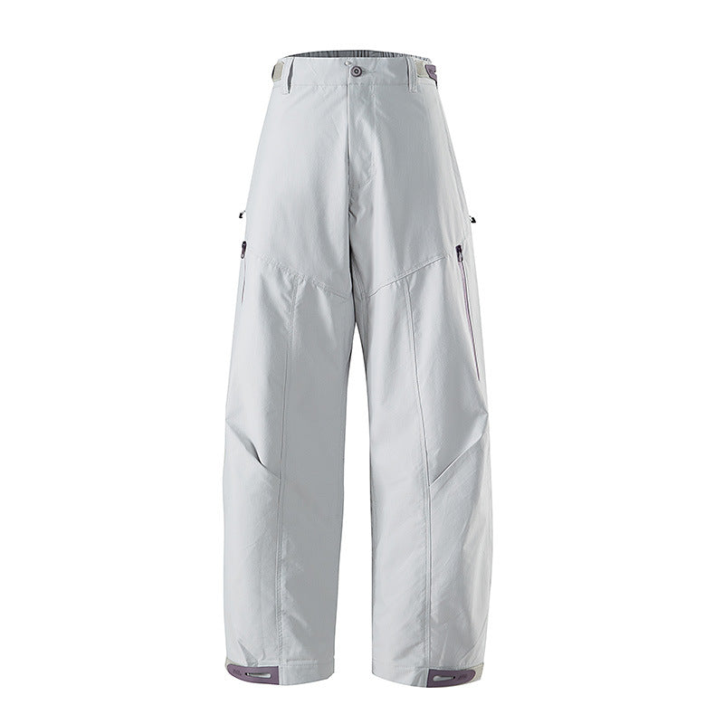 Women's wide technical trekking pants with reinforced knees, zippered pockets, and adjustable hem Amarae