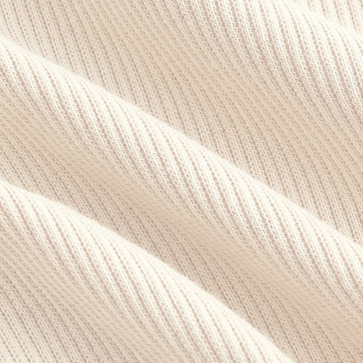 Chemise courte à manches longues pour femmes avec encolure asymétrique et texture fine côtelée Chic & Stil