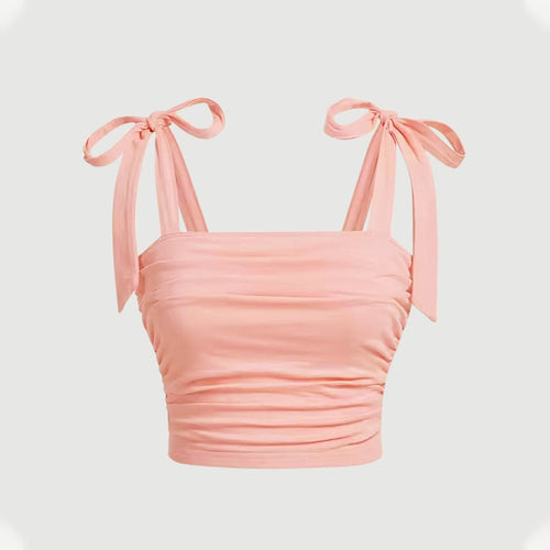 Short top for women with adjustable tie straps and ruffle details on the sides Chic & Stil