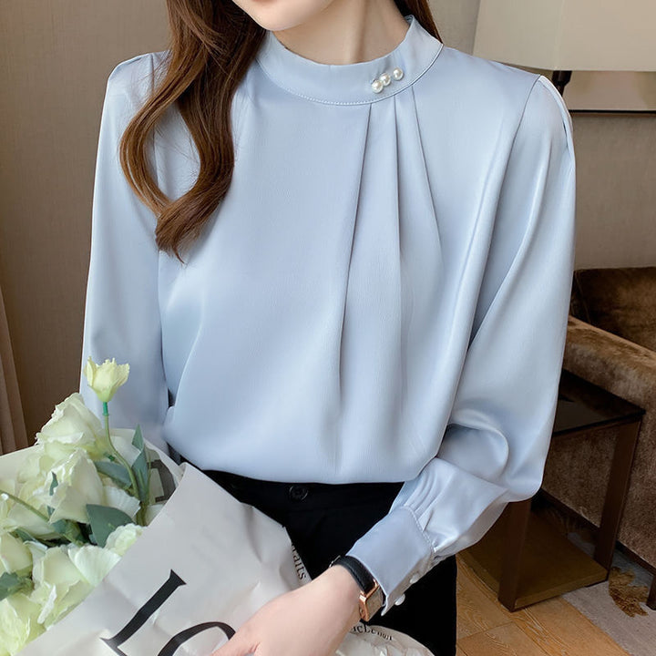 Blouse élégante pour femmes avec des détails en volants et un col stylé Chic & Stil
