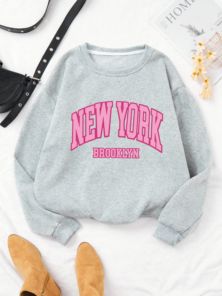 Women's casual sweater with striking NYC print Chic & Stil