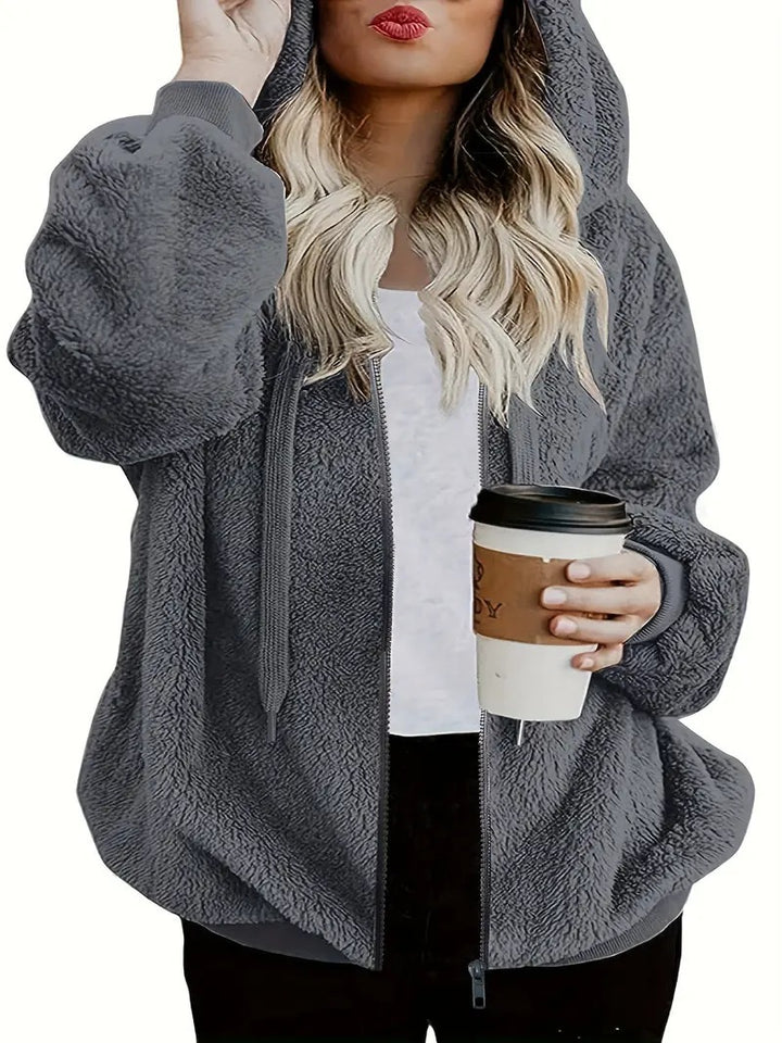 Ladies Soft Hooded Jacket with Zipper Closure and Chic Practical Design