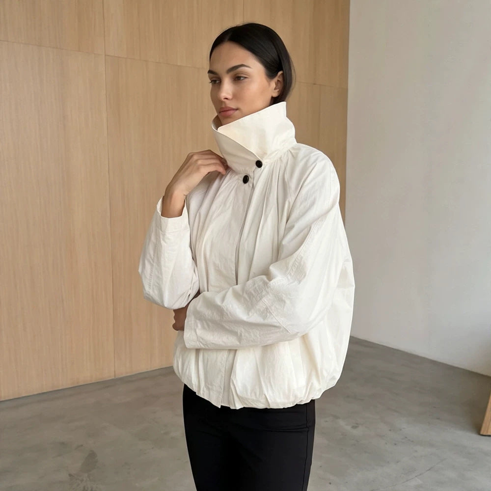 Women's short jacket with high stand-up collar, gathered shoulder area, and elastic hem Amarae
