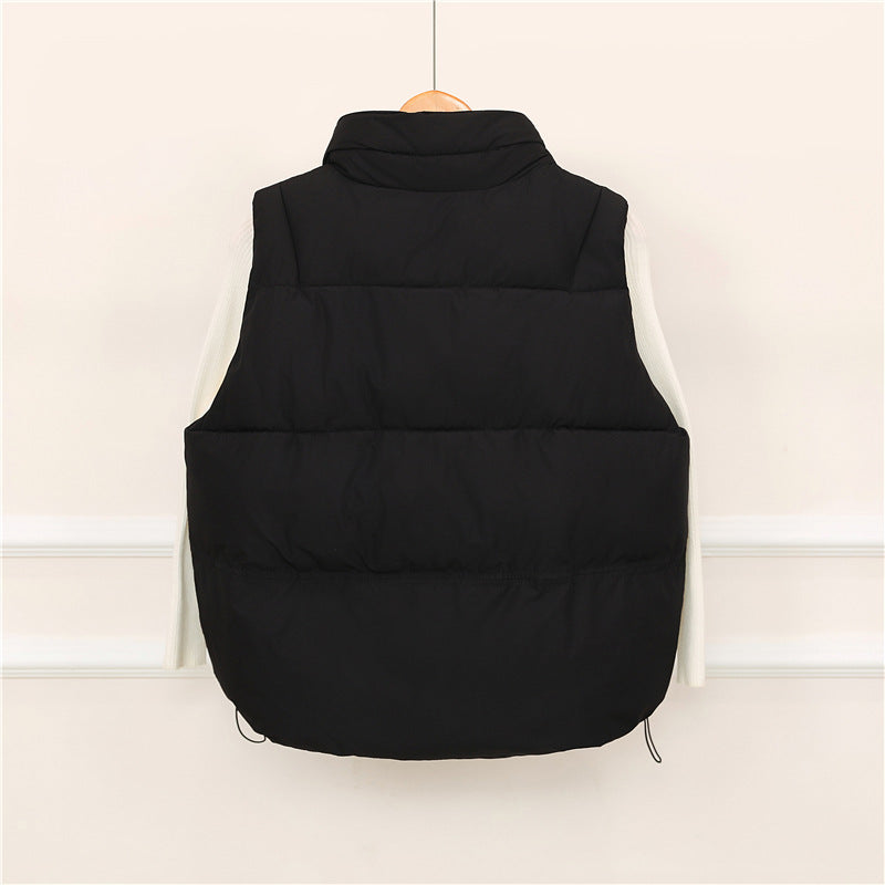 Sporty quilted vest for women with high collar and practical pockets Lune London