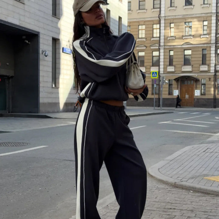 Women's oversized tracksuit with zip jacket, wide joggers, and contrast side stripes Amarae