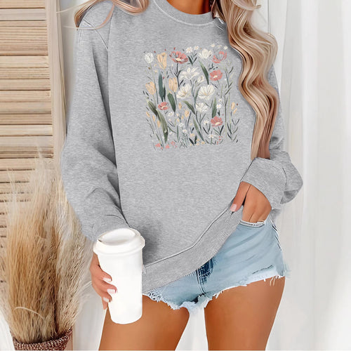 Sweatshirt pour femmes avec motif floral et coupe décontractée Chic & Stil
