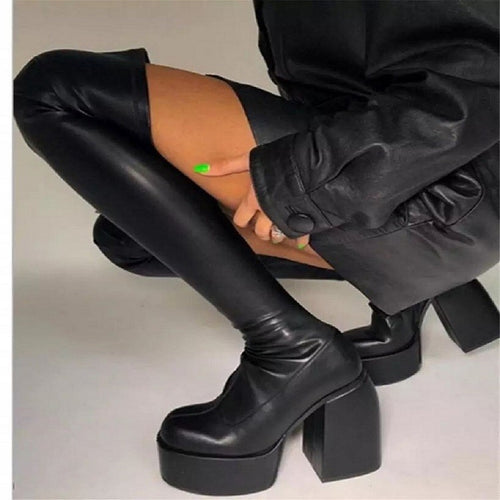 Knee-high boots for women with a chunky block heel and elastic upper material Amarae