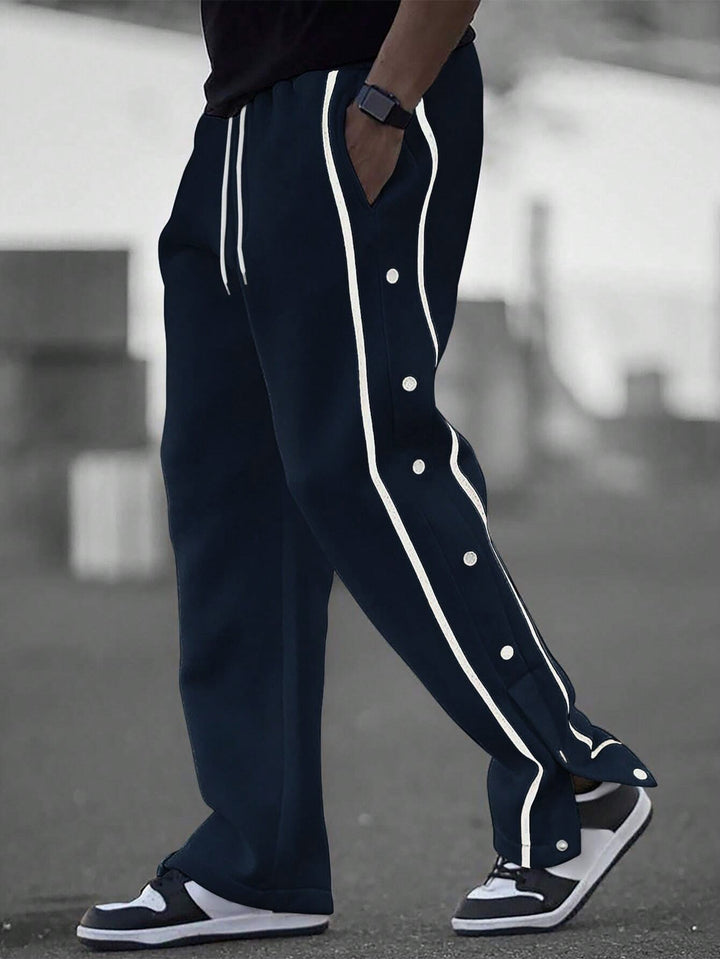 Stylish men's sports pants with snap button details and side pockets Lune London