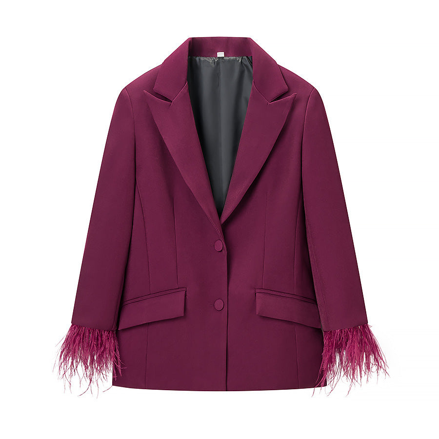 Ladies tailored tuxedo pant suit with feather embellishments at the cuffs Amarae