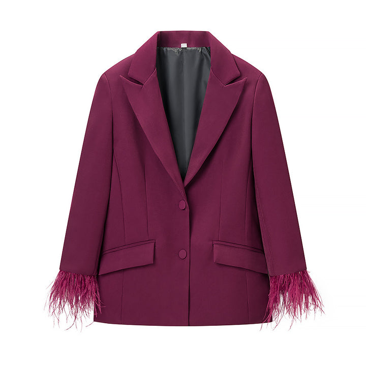 Ladies tailored tuxedo pant suit with feather embellishments at the cuffs Amarae