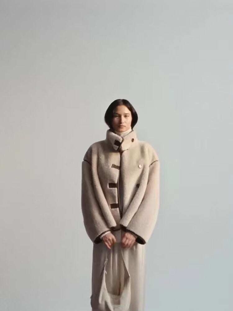 Faux fur jacket for women with a stylish high collar and practical pockets Lune London