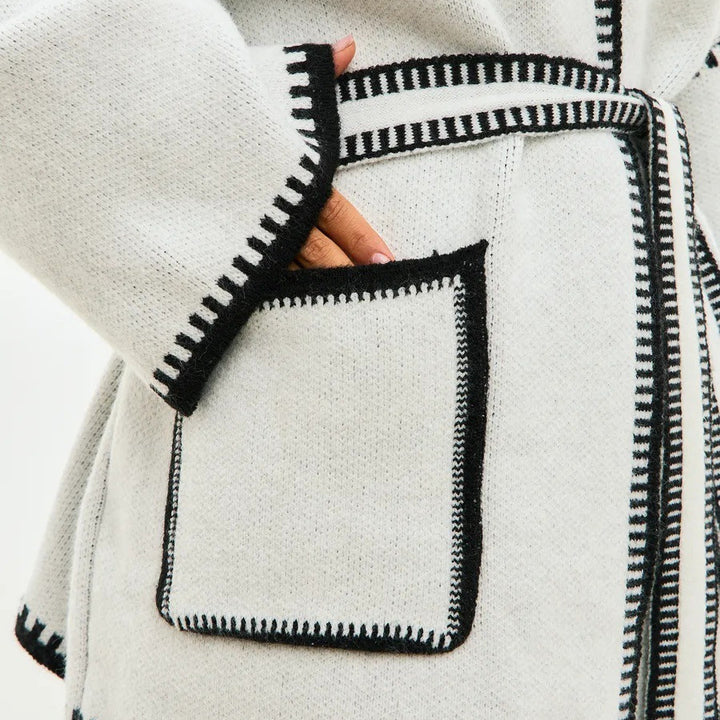 Thick knitted coat for women with practical belt and pockets Lune London