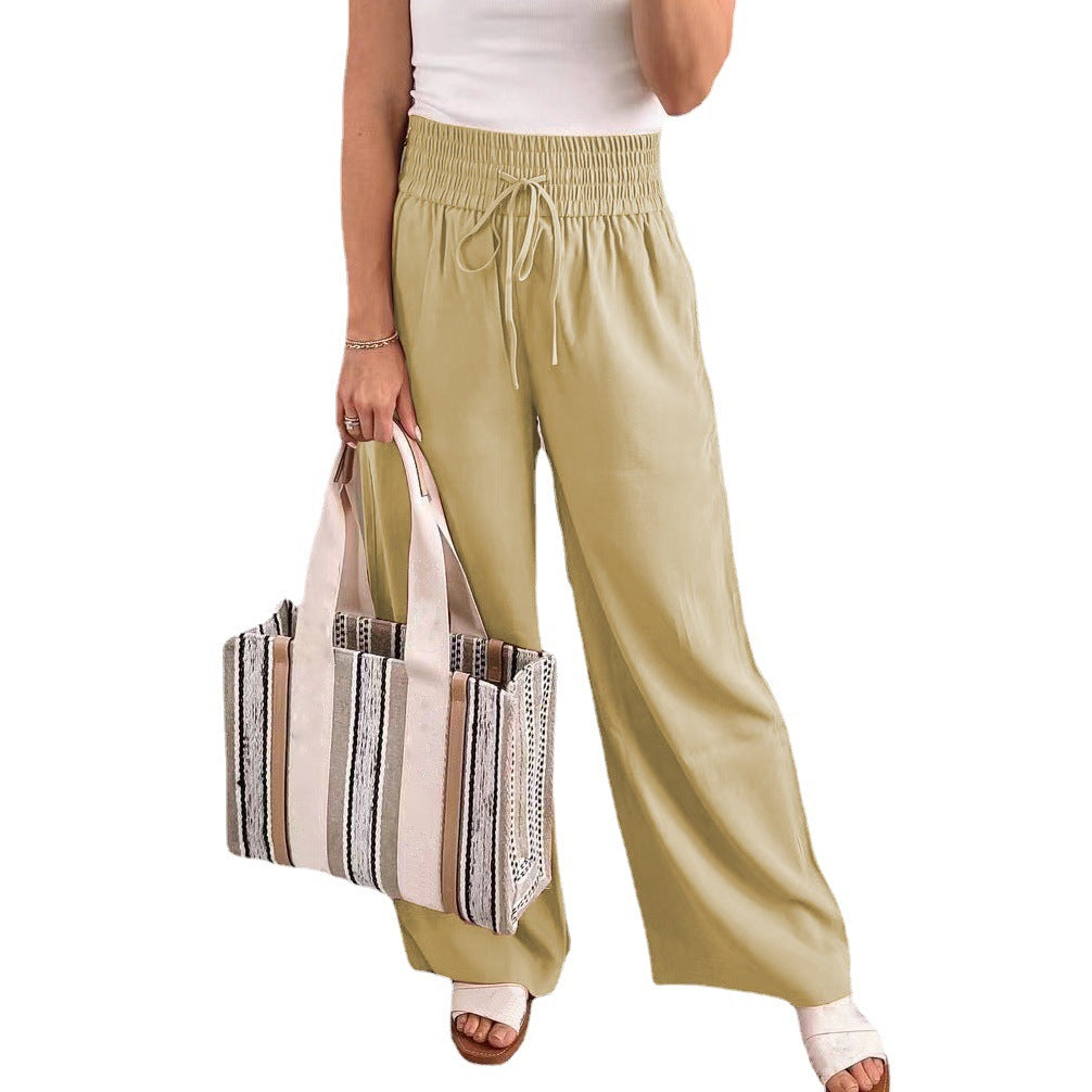 Wide palazzo pants for ladies with elastic waistband and practical pockets Lune London