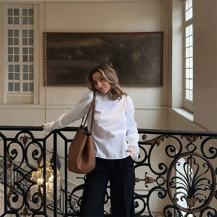 Blouse for women with elegant lace accents and puff sleeves Lune London