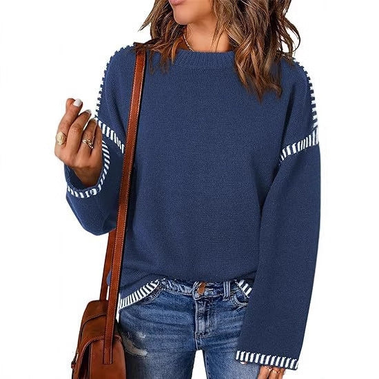 Fashionable women's sweater with structured material and stripe-shaped details Lune London