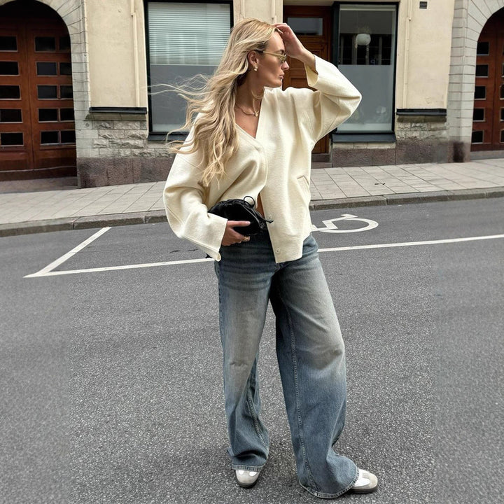 Women's chunky knit cardigan with deep V-neckline, boxy oversized silhouette and patch pockets Amarae