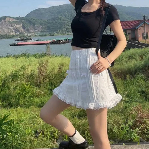 Woman Playful mini skirt with ruffle details and elastic waist Amarae