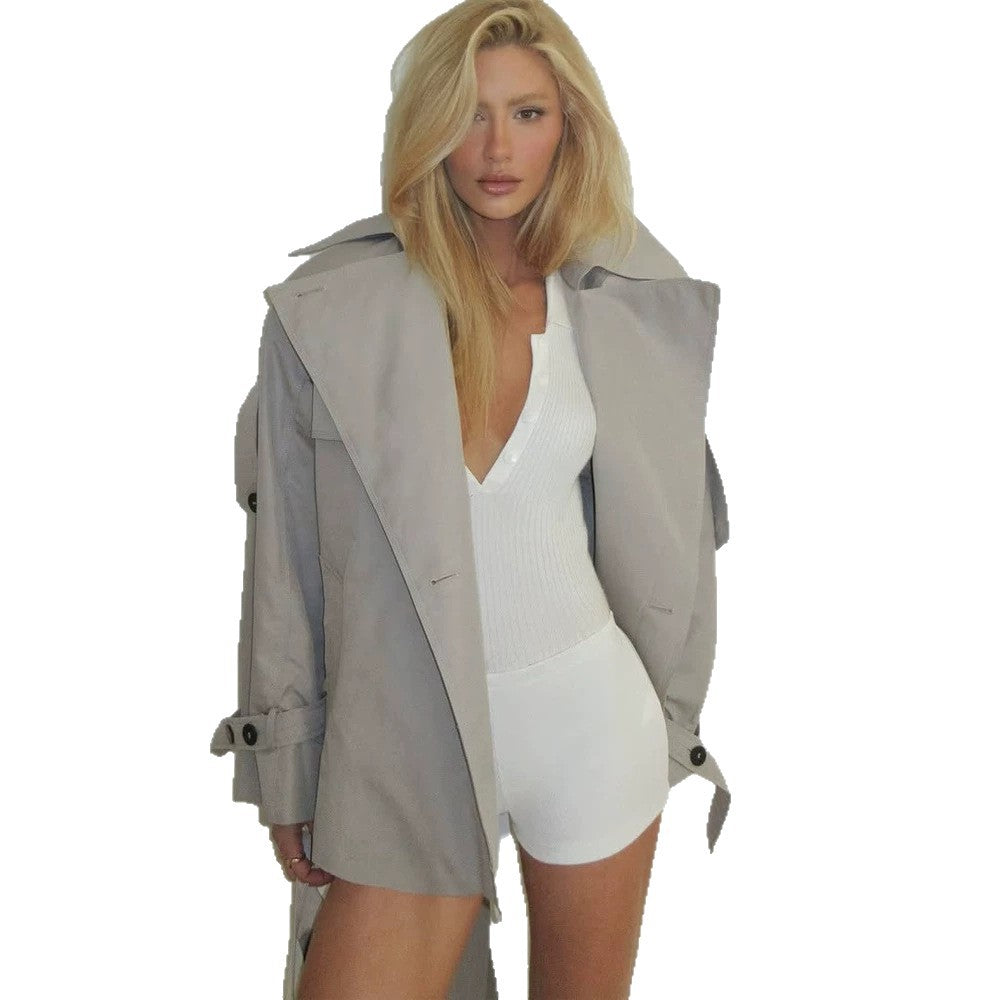 Women's short trench coat in oversized cut with wide lapels and adjustable cuffs Amarae