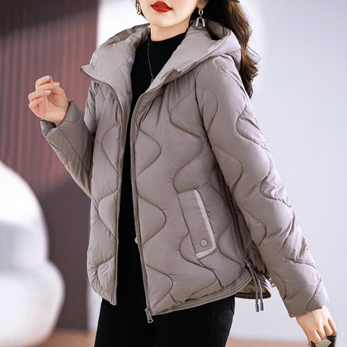Insulated quilted jacket for women with high collar and practical zip pockets Amarae