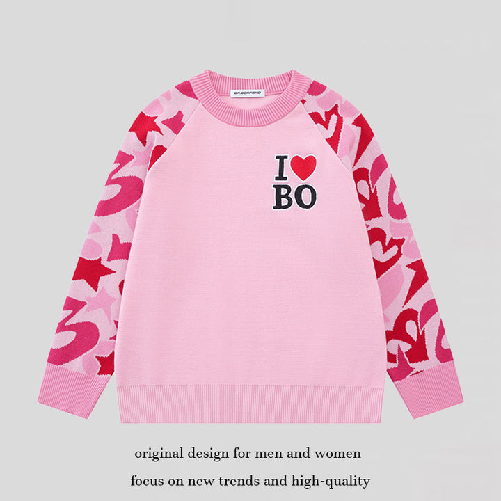 Women's knit sweater with raglan sleeves, statement jacquard sleeves, and ribbed hem Amarae