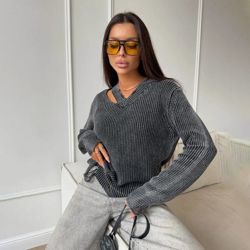 Thick knitted sweater for women with a trendy V-neck and worn elements Amarae