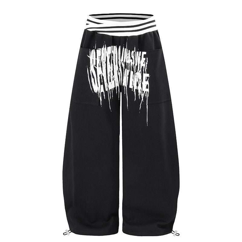 ladies culotte jogging pants with high-contrast waistband, patch pockets, and drawstring hem.