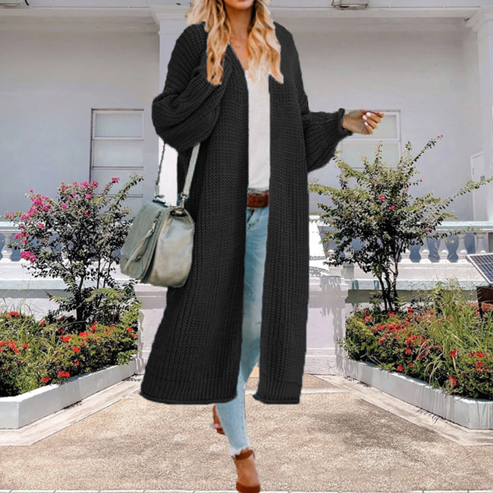 Women’s knit coat with open design and voluminous sleeves Lune London
