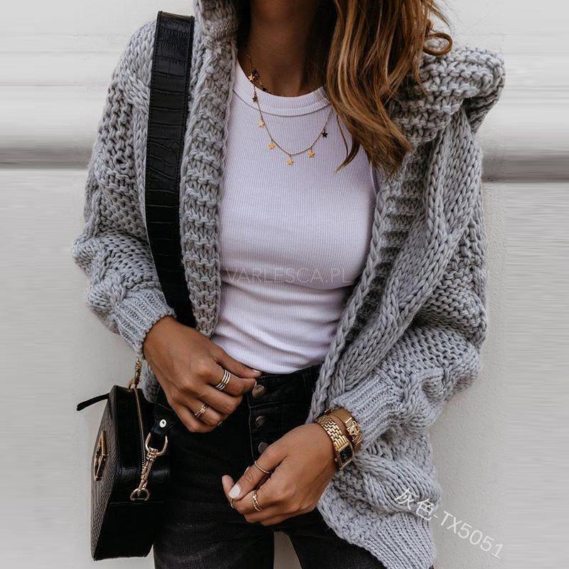 Cardigan femme en tricot épais avec des manches volumineuses et un design moderne Chic & Stil
