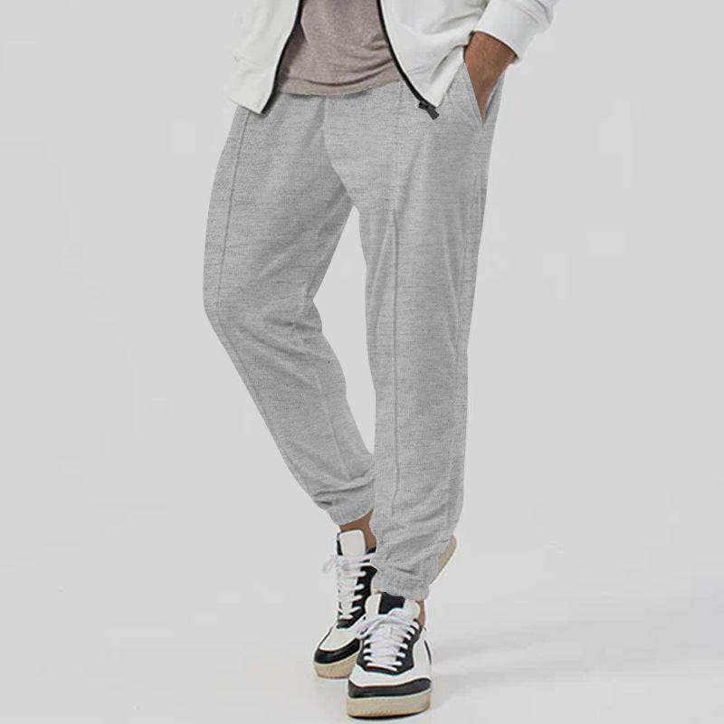 Men's leisure pants with elastic waistband and practical side pockets Lune London