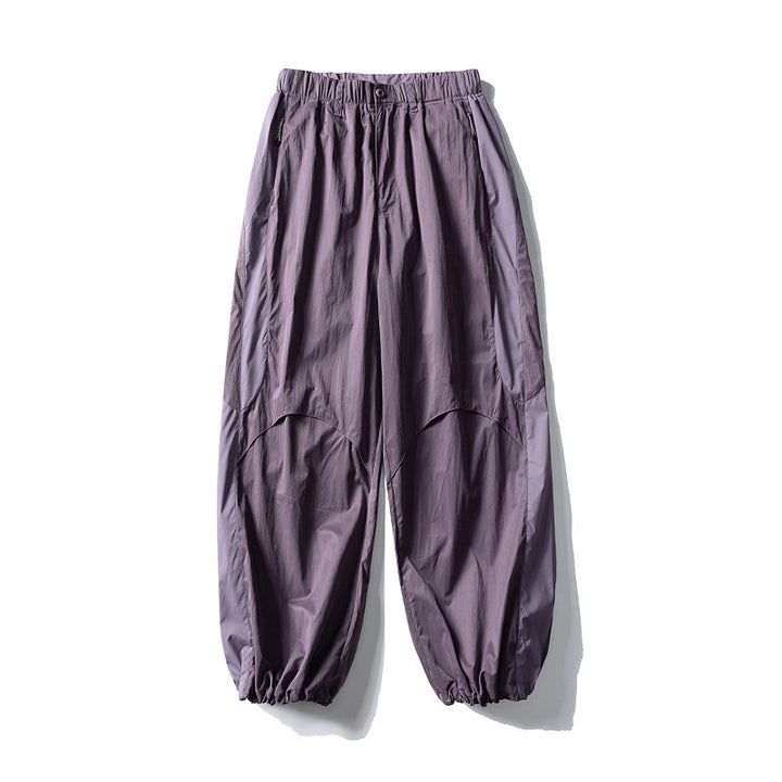 Men's loose technical nylon cargo pants with elastic waistband and panel details Amarae
