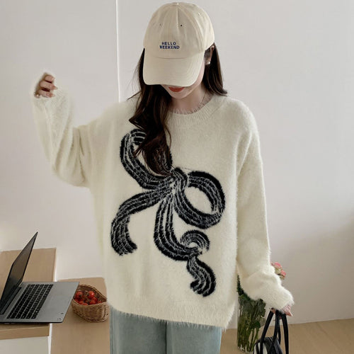 Pull confortable pour femmes avec motif de nœud décoratif