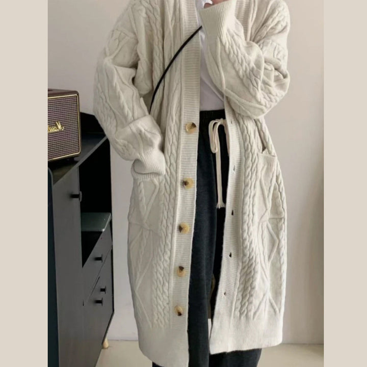 Manteau tricoté pour dames avec motif en câble et poches Chic & Stil