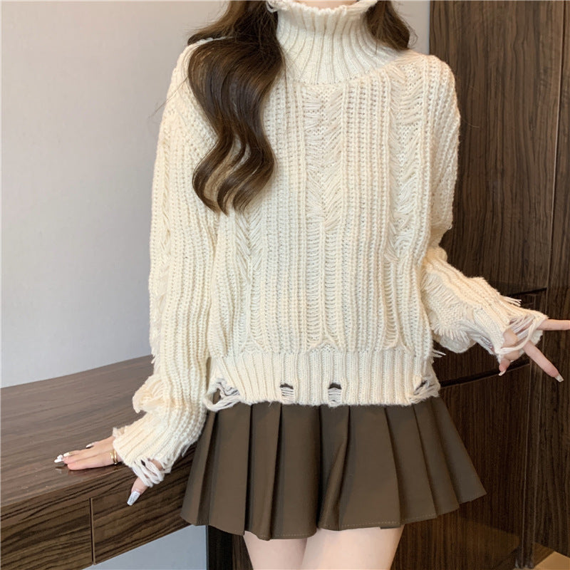 Pull en tricot épais pour femmes avec col montant et franges modernes Chic & Stil