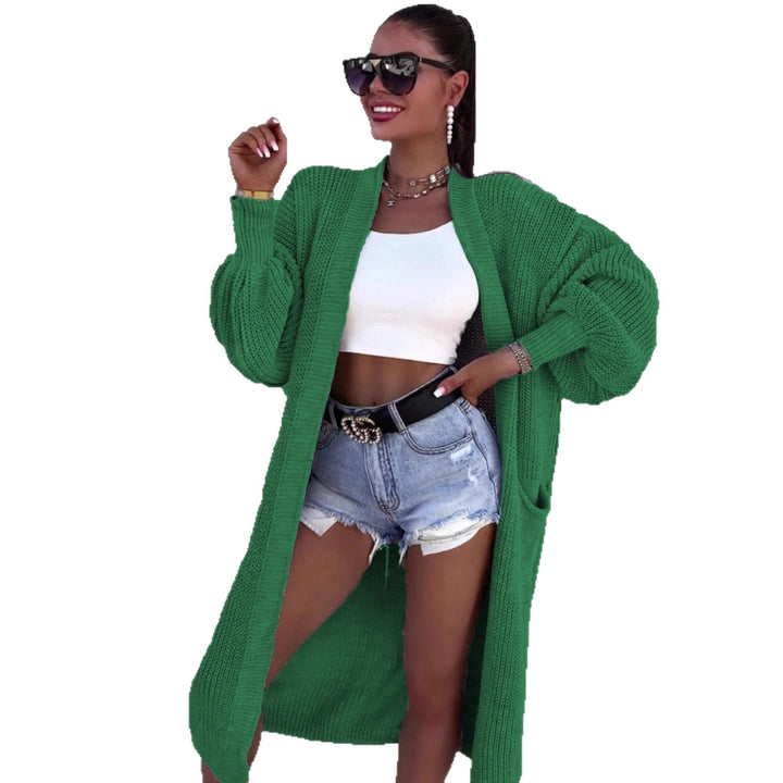 Long knitted coat for women with oversized sleeves and practical pockets Lune London