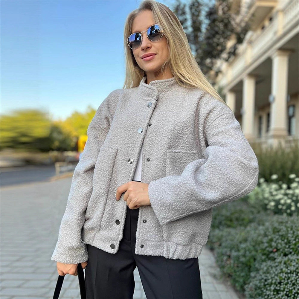 Women's teddy fleece bomber jacket in boxy cut with snap button closure and patch pockets Amarae