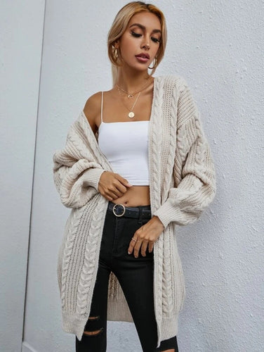 Ladies chunky knit cardigan with deep V-neck and voluminous sleeves Chic and Still