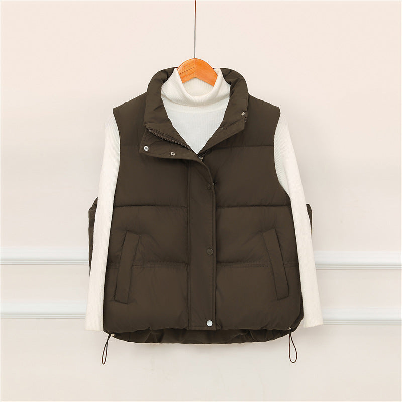 Sporty quilted vest for women with high collar and practical pockets Lune London