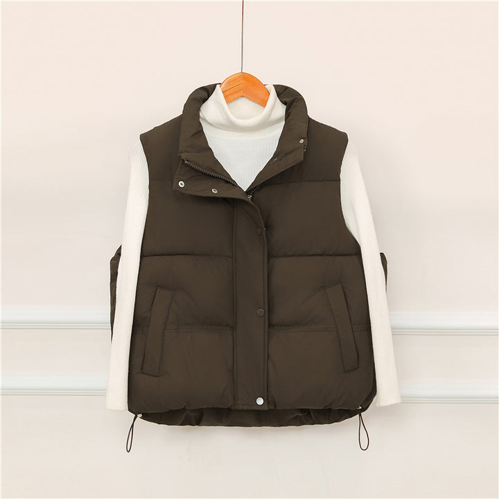 Sporty quilted vest for women with high collar and practical pockets Lune London